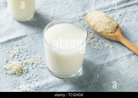 Healthy Organic Vegan Rice Milk in a Glass Stock Photo