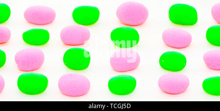 Abstract background from colorful balls of pastel colored playdough on white playdough Stock Photo