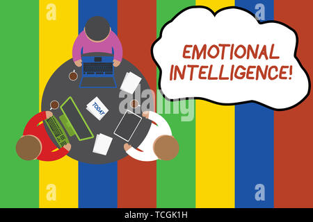 Conceptual hand writing showing Emotional Intelligence. Concept meaning Self and Social Awareness Handle relationships well Working table male employe Stock Photo