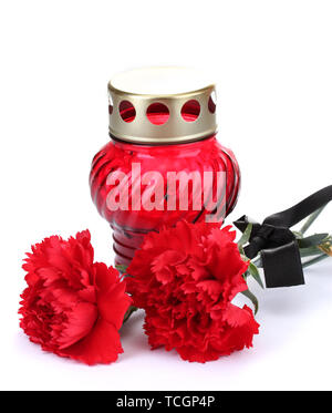 Memory lantern with candle,  carnations and black ribbon isolated on white Stock Photo