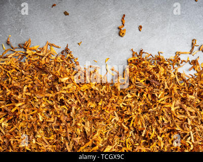 Dry tobacco leaves cut texture. High quality dry cut tobacco big leaf, copy space text place Stock Photo