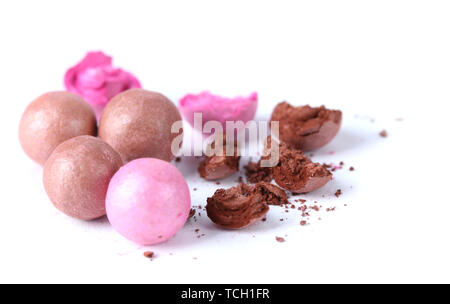 pink and brown powder balls isolated on white Stock Photo