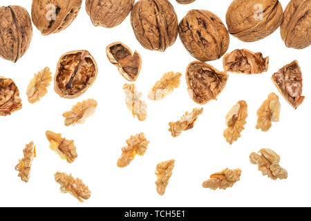 Nuts (whole and open) falling. Isolated on white background. Stock Photo