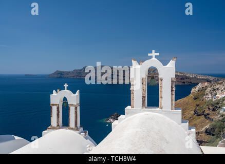 Belltower and bells on Greek Orthodox church in Oia Stock Photo