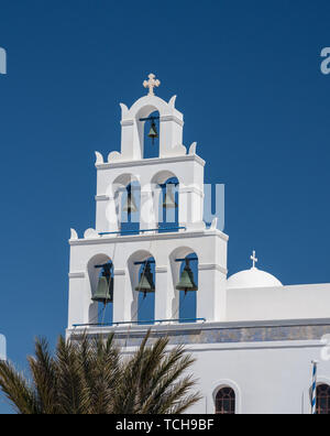 Belltower and bells on Greek Orthodox church in Oia Stock Photo