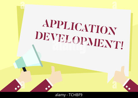 Word writing text Application Development. Business photo showcasing creation of Computer Apps for use on Mobile Devices Hand Holding Megaphone and Ot Stock Photo