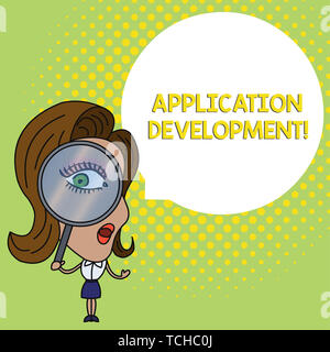 Conceptual hand writing showing Application Development. Concept meaning creation of Computer Apps for use on Mobile Devices Woman Looking Trough Magn Stock Photo