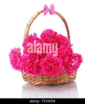 Beautiful pink carnations in basket isolated on white Stock Photo