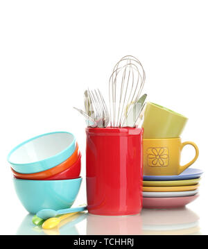 bright empty bowls, cups and kitchen utensils isolated on white Stock Photo