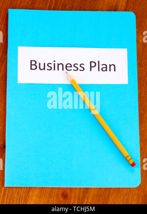 Blue folder labeled business Stock Photo