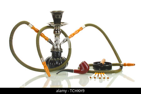 Big hookah for tobacco made of metal, glass and ceramics. Snowing. Snow  background. White — Stock Photo © golib.tolibov.gmail.com #144107635