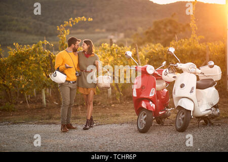 young man and woman enjoying in romantic road trip on vacation. Stock Photo