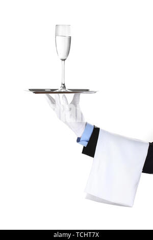 formal waiter with a glass of water on silver tray isolated on white Stock Photo