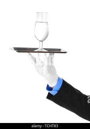 formal waiter with a glass of water on silver tray isolated on white Stock Photo