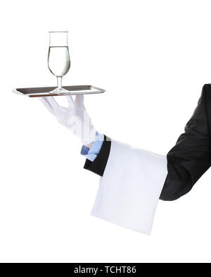 formal waiter with a glass of water on silver tray isolated on white Stock Photo