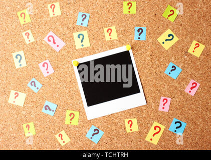 Photo with question marks cork board Stock Photo