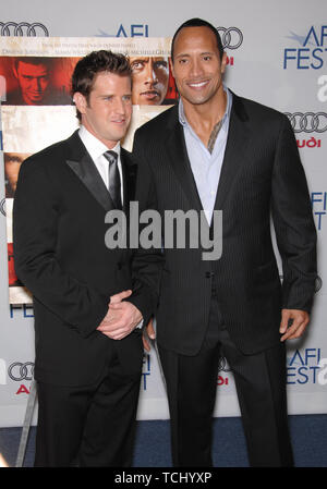 LOS ANGELES, CA. November 03, 2007: Director Richard Kelly (left) & Dwayne Johnson, aka The Rock, at the AFI gala premiere of their new movie 'Southland Tales' at the Arclight Theatre, Hollywood. © 2007 Paul Smith / Featureflash Stock Photo