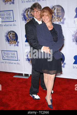 LOS ANGELES, CA. October 13, 2007: Eric Roberts & wife Eliza Roberts at the 2007 World Magic Awards at Barker Hanger, Santa Monica Airport. © 2007 Paul Smith / Featureflash Stock Photo