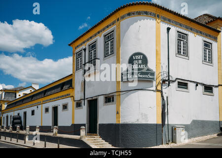 Azeitao, Portugal - June 7, 2019: Sign in English on facade of building of Jose Maria da Fonseca winery in Azeitao, Setubal, Portugal Stock Photo