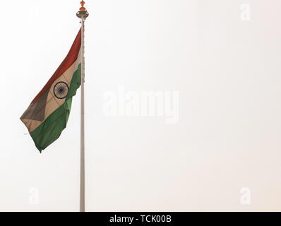 Real India flag waving at railway station. Stock Photo