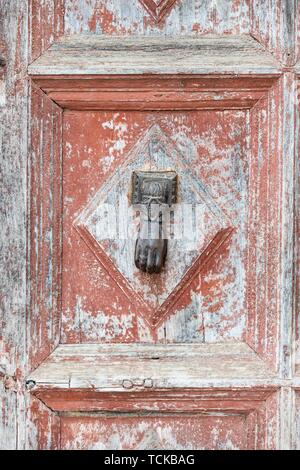 Old door with door knocker in shape of a hand, Alhambra, Granada, Andalusia, Spain Stock Photo