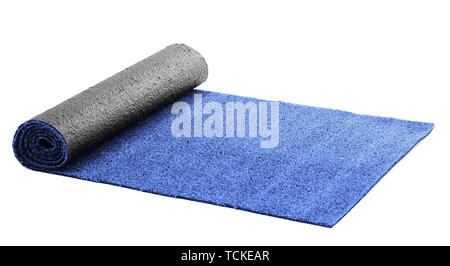 Artificial rolled blue grass, isolated on white Stock Photo