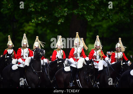 Members of the Household Cavalry makes their way from Buckingham Palace to Horse Guards Parade, in London, ahead of the Trooping the Colour ceremony, as Queen Elizabeth II celebrates her official birthday. Stock Photo