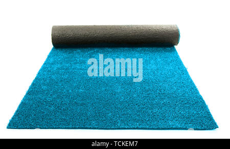 Artificial rolled light blue grass, isolated on white Stock Photo