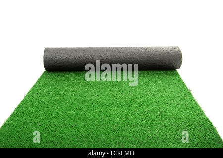 artificial rolled green grass, isolated on white Stock Photo
