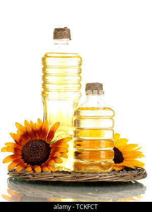 oil in bottles and sunflowers, isolated on white Stock Photo