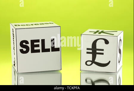 forex. currency in the white dices on green background Stock Photo