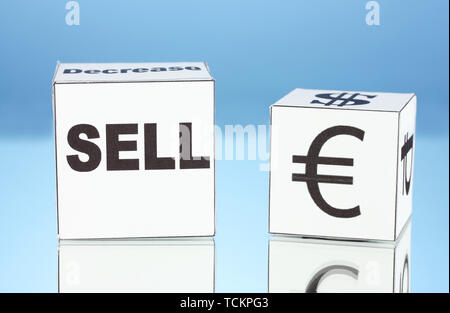 forex. currency in the white dices on blue background Stock Photo