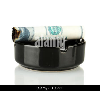 Cigar of the 100 dollar bill and an ashtray isolated on white Stock Photo