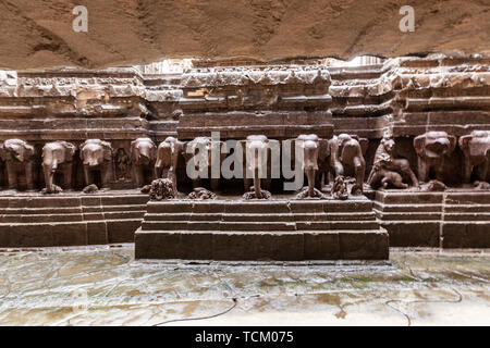 Elephant stone row in the Kailāśa temple: Cave 16, Ellora Caves,  rock-cut monastery-temple cave, Aurangabad district of Maharashtra, India. Stock Photo