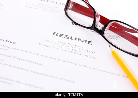 Closeup of resume with glasses - Closeup Of Resume With Pencil And Glasses On Table Tcm1ta 
