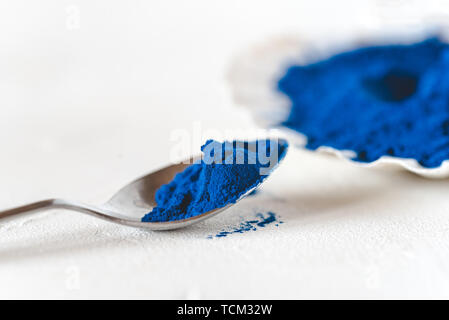 Blue Spirulina algae powder, healthy dietary supplement. Stock Photo