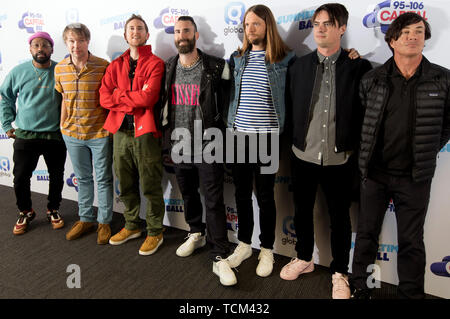 Members of the band Maroon 5, PJ Morton, Mickey Madden, Jesse Carmichael, Adam Levine, James Valentine, Sam Farrar and Ryan Dusick (left to right) on the red carpet of the the media run during Capital's Summertime Ball. The world's biggest stars perform live for 80,000 Capital listeners at Wembley Stadium at the UK's biggest summer party. Stock Photo