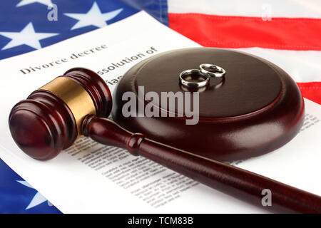 Divorce decree and wooden gavel on american flag background Stock Photo