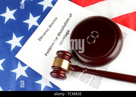 Divorce decree and wooden gavel on american flag background Stock Photo