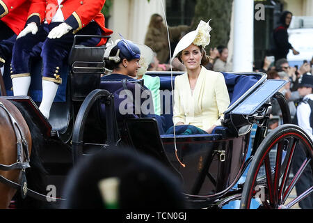 The Mall. London, UK 8 Jun 2019 -London, UK. 8th June 2019. Catherine Duchess of Cambridge and Meghan Duchess of Sussex on their way to Buckingham Palace after attending the Trooping the Colour ceremony to marks the 93rd birthday of Queen Elizabeth II, Britain's longest reigning monarch.  Credit: Dinendra Haria/Alamy Live News Stock Photo
