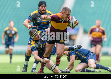 London, UK. 08th, Jun 2019. Leicestershire’s Callum Dacey (centre) is tackled during Bill Beaumont County Championship Division 2 Final: Surrey v Leicestershire at Twickenham Stadium on Saturday, 08 June 2019. LONDON England .  (Editorial use only, license required for commercial use. No use in betting, games or a single club/league/player publications.) Credit: Taka G Wu/Alamy Live News Stock Photo