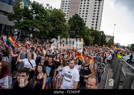 Warsaw, Poland. 08th June, 2019. A crowd marches through Warsaw during the Warsaw Pride. The Equality March also called the Warsaw Pride parade, brought thousands of people to the streets of Warsaw, at the time when the gay rights movement in Poland is under siege by hate speech and a government campaign depicting it as a threat to families and society. Credit: SOPA Images Limited/Alamy Live News Stock Photo