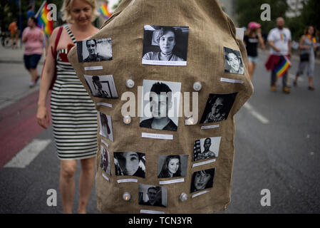 Warsaw, Poland. 08th June, 2019. A sack with the pictures of young lgbt people who recently have committed suicide because of persecutions from other people. The Equality March also called the Warsaw Pride parade, brought thousands of people to the streets of Warsaw, at the time when the gay rights movement in Poland is under siege by hate speech and a government campaign depicting it as a threat to families and society. Credit: SOPA Images Limited/Alamy Live News Stock Photo