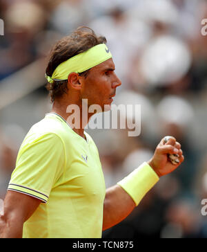 Paris, France.  9th June, 2019. Rafael Nadal of Spain reacts during the men's singles final with Dominic Thiem of Austria at French Open tennis tournament 2019 at Roland Garros, in Paris, France on June 9, 2019. Credit: Han Yan/Xinhua/Alamy Live News Stock Photo