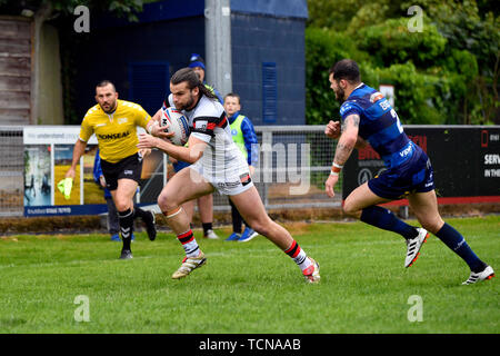 Sale, Greater Manchester, UK. 9th June 2019, Heywood Road stadium, Sale, Greater Manchester, England; Betfred Rugby Championship, Swinton versus Toronto Wolfpack; Liam Kay of Toronto Wolfpack breaks down the wing with the ball Credit: Action Plus Sports Images/Alamy Live News Stock Photo