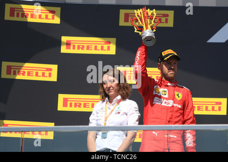 Quebec, Canada. 09th June, 2019. 9th June 2019, Circuit Gilles Villeneuve, Montreal, Quebec, Canada; Formula 1 Grand Prix of Canada, Race day; Scuderia Ferrari, Sebastian Vettel holds up his 2nd placed trophy Credit: Action Plus Sports Images/Alamy Live News Stock Photo