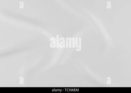 White silk fabric with smooth pleats and slight gloss. Stock Photo