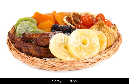 Dried fruits on wicker plate isolated on white Stock Photo