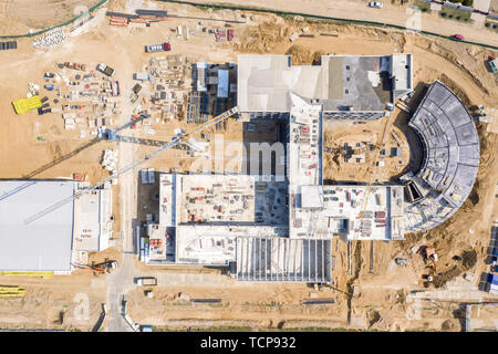 public building construction site. tower cranes and other industrial machinery. aerial top view Stock Photo