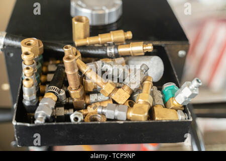 Nuts and Bolts in mechanics Garage workshop Stock Photo